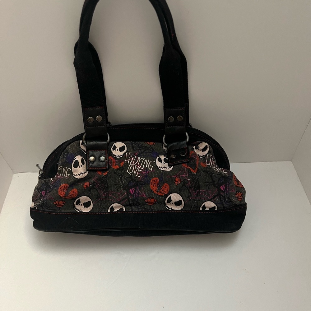 Disneys Nightmare Before Christmas byTim Burton. Cute, small purse.